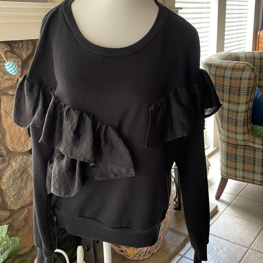 Black ruffled top